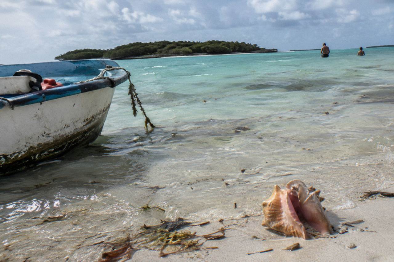 Calm turquoise shallow water at a sandbar in the Exuma Cays